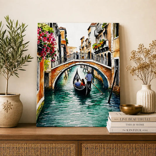 Venice Italy gondola canal cityscape with a gondolier rowing beneath a bougainvillea-draped stone bridge watercolor painting, styled on a console table - Italy travel wall art, Europe cityscape canvas wall art, Venice poster artwork print for living room, bedroom and home office wall decor