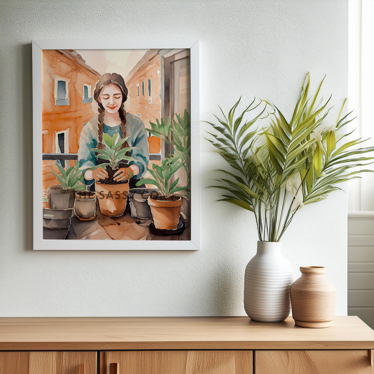 An orange, green boho watercolor artwork of a woman gardening. Boho watercolor style wall art painting canvas, framed art print for drawing room, home wall decor. Boho wall decor ideas for modern Indian homes. Buy wall art painting online