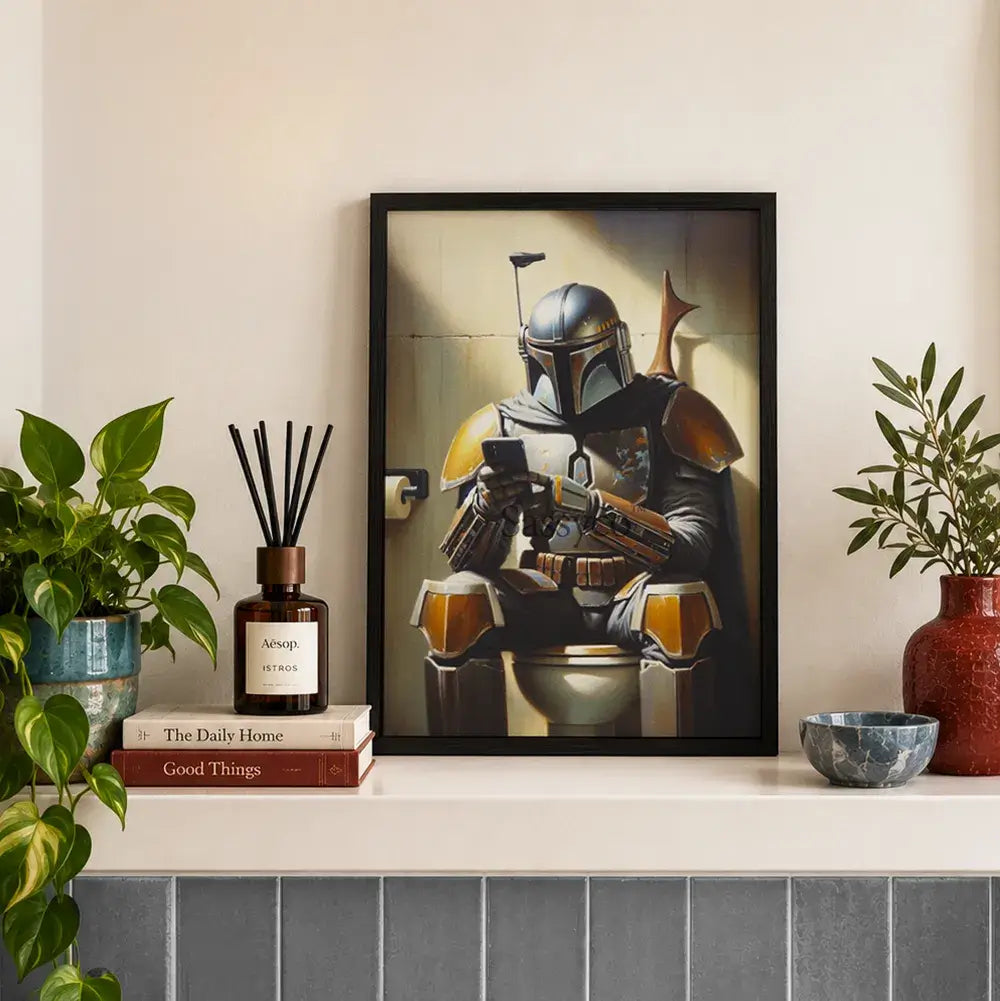 Star Wars inspired, Funny Mandalorian bathroom wall art print painting canvas poster, framed print for bathroom wall decor. The Mandalorian sitting on the WC toilet using his phone. Framed funny star wars canvas wall art print posters for game room, office, bathroom decor.
