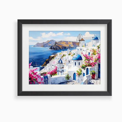 Santorini Greece Oia village cityscape with whitewashed homes, blue-domed churches, a windmill and bougainvillea over the Aegean Sea painting, framed in a black frame, styled in a living room - Greece island travel wall art, Mediterranean coastal canvas wall art, Santorini poster artwork print for living room, bedroom and home office wall decor