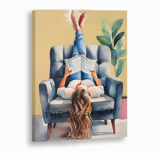 A yellow, blue boho style watercolor modern artwork of a woman reading book. Boho watercolor wall art painting canvas, framed art print for bedroom, living room, home wall decor. Boho wall decor ideas for modern Indian homes. Buy wall art painting online 