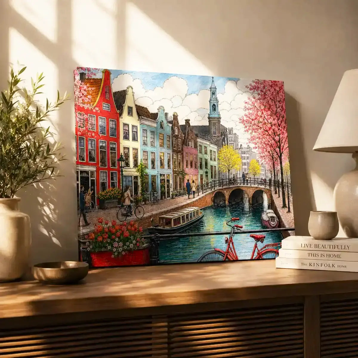 Amsterdam Netherlands canal cityscape with colourful gabled houses, cherry blossom trees and a red bicycle watercolor painting, styled in a living room - Dutch travel wall art, Europe cityscape canvas wall art, Amsterdam poster artwork print for living room, bedroom and home office wall decor