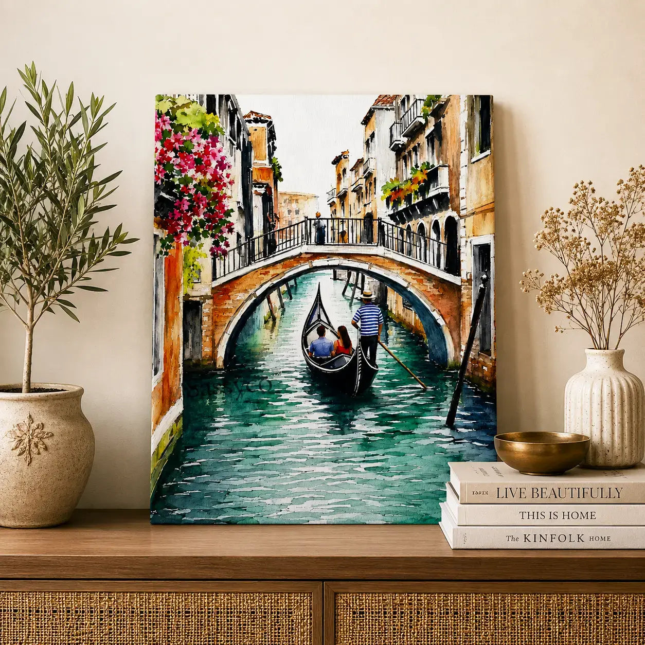 Venice Italy gondola canal cityscape with a gondolier rowing beneath a bougainvillea-draped stone bridge watercolor painting, styled on a console table - Italy travel wall art, Europe cityscape canvas wall art, Venice poster artwork print for living room, bedroom and home office wall decor